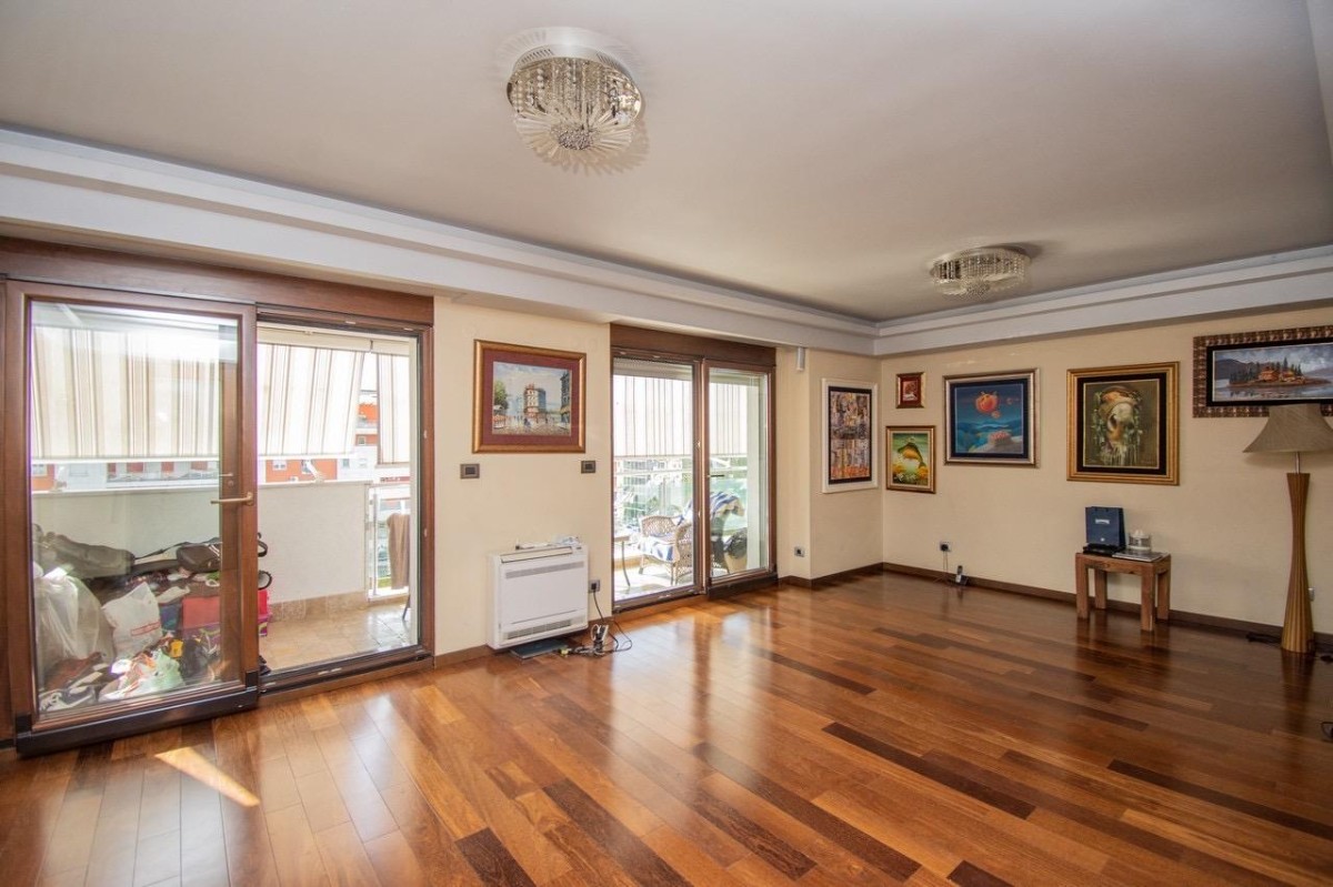 An extraordinary two-bedroom apartment for sale in the Normal Company building, Džorža Washingtona Boulevard, Podgorica.